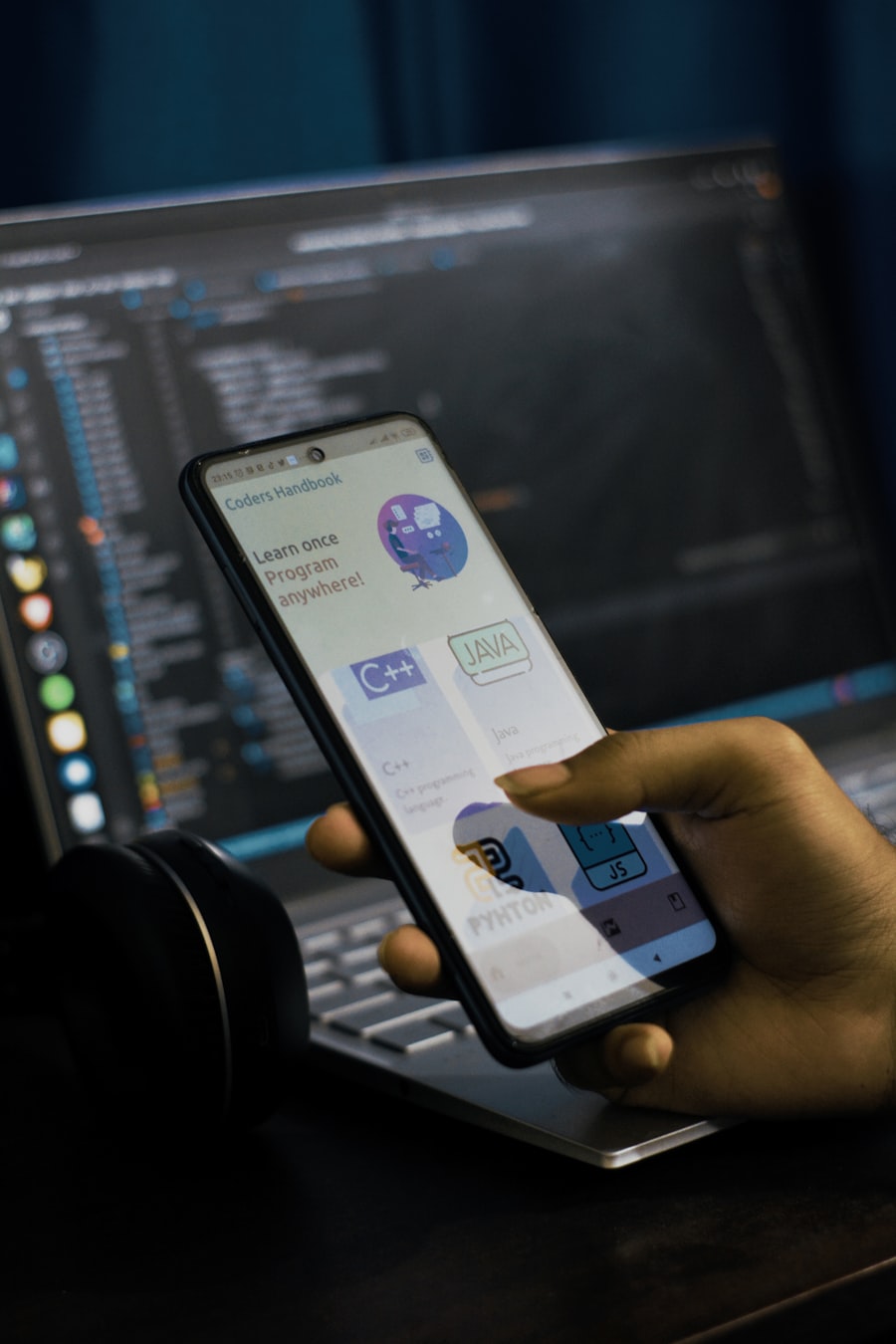 Mobile app development on smartphone and laptop